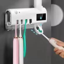 Wall-mounted toothbrush holder with integrated toothpaste dispenser